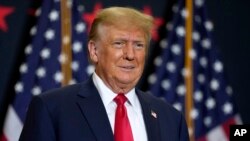 FILE - Former US President Donald Trump speaks Dec. 19, 2023, in Waterloo, Iowa.