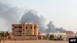 Smoke billows in the distance around the Khartoum Bahri district amid ongoing fighting in Sudan on July 14, 2023. 