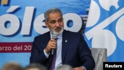 FILE - Haitham Al Ghais, Secretary General of the Organization of the Petroleum Exporting Countries (OPEC), speaks during a news conference with Mexico's Secretary of Energy Rocio Nahle Garcia in Mexico City, Mexico March 9, 2023