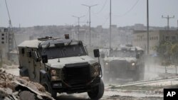 រថយន្ត​យោធា​អ៊ីស្រាអែល​ធ្វើ​ប្រតិបត្តិការ​នៅ​ទីក្រុង Jenin ក្នុង​តំបន់​ West Bank នាថ្ងៃសុក្រ​ ទី ៥ ខែកក្កដា ឆ្នាំ ២០២៤។ 