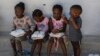 Camping in schools, hungry Haiti families ask: When will normality return? 