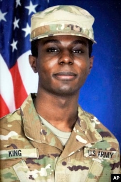 This family photo shows a portrait of American soldier Travis King displayed at the home of his grandfather Carl Gates, Wednesday, July 19, 2023, in Kenosha, Wis. (Family Photo via AP)
