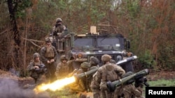 FILE - A Filipino soldier fires a Javelin anti-tank weapon system during a live exercise as part of the annual U.S.-Philippines joint military exercises called "Balikatan" at Fort Magsaysay, Nueva Ecija province, April 13, 2023.