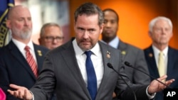 FILE - Rep. Mike Waltz, a Florida Republican, gestures during a news conference on Capitol Hill in Washington, Jan. 4, 2023.