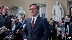 Speaker of the House Mike Johnson, talks to reporters just after the House voted to approve $95 billion in foreign aid for Ukraine, Israel and other U.S. allies, at the Capitol in Washington, April 20, 2024. 