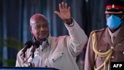 Rais wa Youganda akizungumza katika mkutano wa kibiashara wa kikanda uliofanyika Nairobi April 8,2022. Picha na Tony KARUMBA / AFP. 