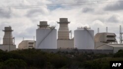 L'économie sud-africaine renoue ainsi en 2023 avec un taux de croissance modeste qui était sa marque de fabrique avant la crise sanitaire du Covid (+0,3% en 2019, après +1,6% en 2018 et +1,2% en 2017). (Photo by RODGER BOSCH / AFP)