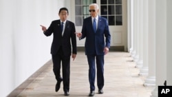 President Joe Biden and Japanese Prime Minister Fumio Kishida walk along the colonnade of the White House after a State Arrival Ceremony, April 10, 2024.