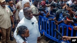 FILE - Sierra Leone President Julius Maada Bio speaks after casting his ballot in Sierra Leone general elections in Freetown, on June 24, 2023. 
