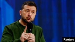 FILE - Ukraine's President Volodymyr Zelenskyy speaks in Kyiv, Feb. 25, 2024.