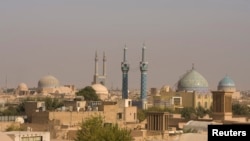 FILE - The skyline of the Iranian city of Yazd is shown in this Oct. 15, 2008, photo. Anjireh Sangi, a caravanserai near Yazd, is one of the 56 historic roadside rest stops for travelers along the country's ancient trade routes added to the United Nations World Heritage List. 