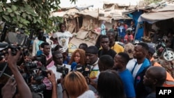 FILE - A man previously detained at the Rebeuss prison in connection with the recent wave of unrest speaks to the press upon his release in Dakar on Feb. 19, 2024. 