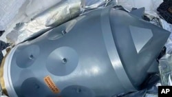 This image from an FBI affidavit filed in U.S. District Court, Alexandria, Va., shows what is described as an Iranian-made warhead bound for Yemen's Houthis, seized off a vessel in the Arabian Sea in January 2024. 