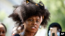 Assa Traore attends a banned protest against police violence July 8, 2023 in Paris. Her brother Adama died in the custody of French police in 2016.
