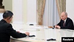 Russian President Vladimir Putin holds a meeting with Chinese Defense Minister Li Shangfu in Moscow, Russia, April 16, 2023. (Sputnik via Reuters)