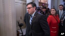 House Speaker Mike Johnson enters the House chamber as lawmakers prepared to vote on the articles of impeachment against Homeland Security Secretary Alejandro Mayorkas at the Capitol in Washington, Feb. 6, 2024. The vote failed.