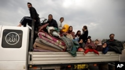 Palestinians flee the Israeli ground offensive in Khan Younis, Gaza Strip, Dec. 27, 2023.