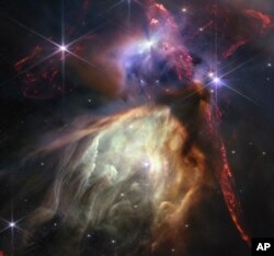 This first anniversary image released Wednesday, July 12, 2023, shows NASA’s James Webb Space Telescope displaying a star birth like it’s never been seen before. (NASA, ESA, CSA, STScI, Klaus Pon via AP)