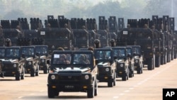 FILE - Myanmar military officers leave the venue during a parade to commemorate Myanmar's 78th Armed Forces Day in Naypyitaw, Myanmar, March 27, 2023. 