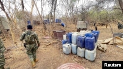 A clandestine lab to process synthetic drugs is raided by the Mexican navy (SEMAR) in the municipality of Rancho Viejo, Sonora state, Mexico, in this handout distributed on Feb. 12, 2024.