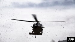 Sejumlah puing-puing yang diduga berasal dari helikopter militer Jepang ditemukan setelah helikopter Black Hawk yang mengangkut 10 awak diduga jatuh di laut. (Foto: ilustrasi/AFP)