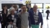 French citizen released from Iran prison returns home 