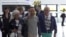 This grab taken from pool video footage made available by LCI television network shows French citizen Louis Arnaud flanked by his mother and father upon arrival at Le Bourget airport, north of Paris, June 13, 2024. 