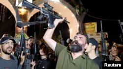 People protest against arrests made by Palestinian Authority in Jenin, in the Israeli-occupied West Bank, July 17, 2023.