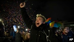 A supporter of the same-sex marriage bill, reacts during a rally at central Syntagma Square, in Athens, Greece, Feb. 15, 2024.
