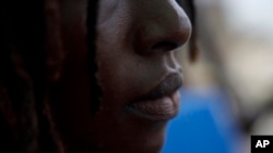 FILE - Efua, a 25-year-old fashion designer and single mother in Ghana who became pregnant in 2023, poses for a photo in Accra, Ghana, March 19, 2024. 