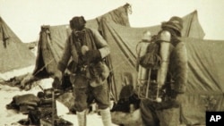 FILE - British mountaineers George Mallory is seen with Andrew Irvine at the base camp in Nepal, both members of the Mount Everest expeditions 1922 and 1924, as they get ready to climb the peak of Mount Everest, June 1924. 