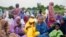 Nigerian Muslim women and children attend Eid al-Adha prayers at an open field in Lagos, June 28, 2023. African Muslim leaders meeting in Cameroon on July 14, 2023, said the idea that women should be allowed to carry out only domestic chores and farm work is an outdated.
