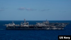 올해 1월 미일 연합해상훈련에 참가한 함정들. 왼쪽부터 알레이 버크급 유도미사일 구축함 USS 다니엘 K. 이노우에(DDG-118), 니미츠급 항공모함 USS 칼 빈슨(CVN-70), 휴가급 헬기 구축함 JS 이세(DDH-182), 니미츠급 항공모함 USS 시어도어 루스벨트(CVN-71). 사진 = 미 해군.