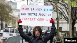 Max Azzarello of St. Augustine, Florida, who police identified as the man who set himself on fire on Friday outside the New York courthouse where Donald Trump's trial was taking place, stands a day earlier outside the same courthouse, April 18, 2024.