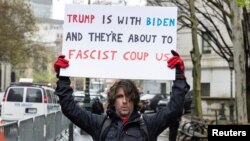 Max Azzarello of St. Augustine, Florida, who police identified as the man who set himself on fire on Friday outside the New York courthouse where Donald Trump's trial was taking place, stands a day earlier outside the same courthouse, April 18, 2024.