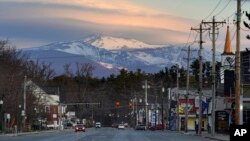 Mount Washington dominates the scene in this view of the business district in the village of North Conway, New Hampshire, April 13, 2023.