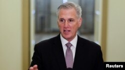 FILE — U.S. House Speaker Kevin McCarthy speaks with reporters at the U.S. Capitol in Washington, Sept. 20, 2023. On Tuesday, he called on President Joe Biden to tighten border restrictions to prevent much of the U.S. government from shutting down.