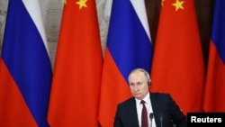 资料照：俄罗斯总统普京与中国领导人习近平在俄罗斯克里姆林宫举行会谈。（2023年3月21日）