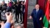 In this photo provided by the Belarusian Presidential Press Service, President Alexander Lukashenko addresses the media after voting, at a polling station in Minsk, Belarus, Feb. 25, 2024.
