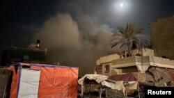 20일 가자지구 남부 칸 유니스에 이스라엘 군의 공습으로 발생한 연기가 피어오르고 있다.