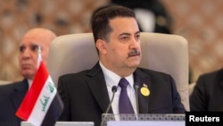 FILE - Iraqi Prime Minister Mohammed Shia al-Sudani, shown here at the Arab League Summit in Jeddah, Saudi Arabia, on May 19, 2023, said Friday his government is beginning a process to end the international coalition in Iraq. (Iraqi Prime Minister Media Office via Reuters)