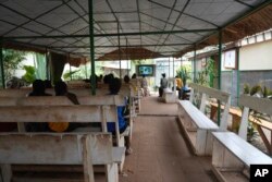 Women gather at a Doctors Without Borders clinic that provides support for people who have been sexually assaulted, in Bangui, Central African Republic, March 11, 2024.