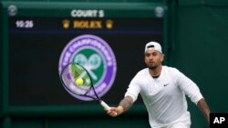 Australia's Nick Kyrgios practices at the All England Lawn Tennis and Croquet Club in Wimbledon, England, July 1, 2023, ahead of the Wimbledon tennis championships. He pulled out of the tournament because of a wrist injury on Sunday.
