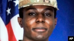 This portrait of American soldier Travis King is displayed at the home of his grandfather Carl Gates, July 19, 2023, in Kenosha, Wis.