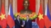 Philippine President Ferdinand Marcos Jr., left, and Vietnamese President Vo Van Thuong shake hands before a meeting in Hanoi, Vietnam, Jan. 30, 2024. 