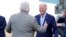 President Joe Biden greets former Rep. Bob Brady as he arrives at Philadelphia International Airport, March 8, 2024. The president and first lady Jill Biden were headed to Delaware County, Pa., for a campaign event.