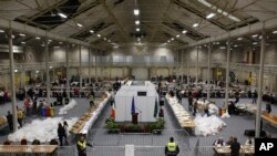 Counting in progress for the twin referendum to change the Constitution on family and care continues at the Royal Dublin Society (RDS), in Dublin, March 9, 2024.