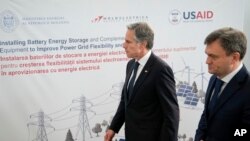 United States Secretary of State Antony Blinken, left, and Moldova's Prime Minister Dorin Recean visit the site of Moldelectrica Chisinau Substation in Braila south of the capital of Moldova, May 29, 2024.