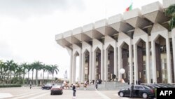 FILE - Delegates arrive at the Unity Palace, the Cameroonian Presidential Palace, in Yaounde for the heads of state of the Central African Economic and Monetary Community (CEMAC) member countries meeting during an extraordinary summit, Nov. 22, 2019.
