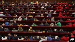 FILE - Lawmakers are seen during a special session of Parliament in Cape Town, South Africa, Dec. 13, 2022.